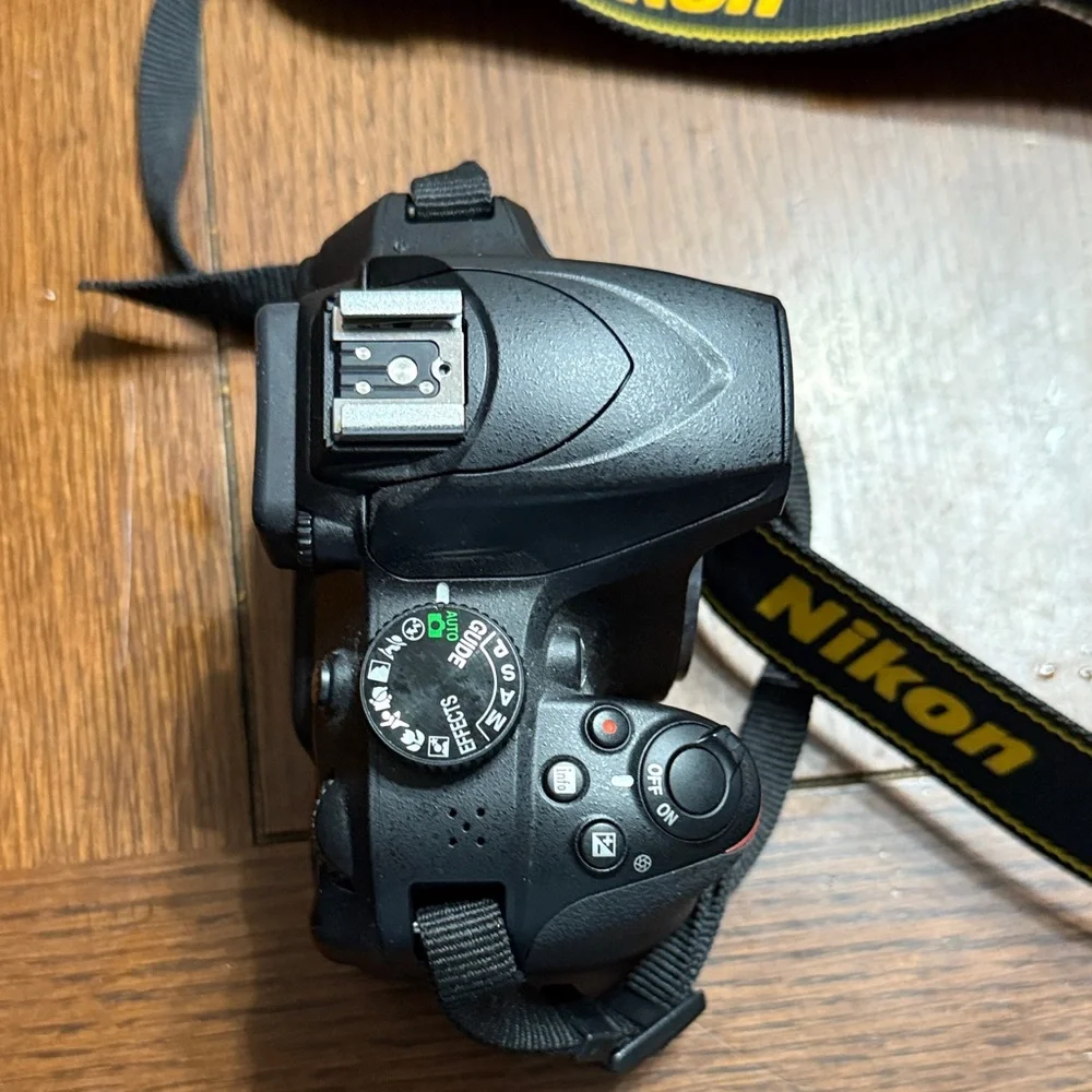 Nikon Black D3400 DSLR with Yellow Accents